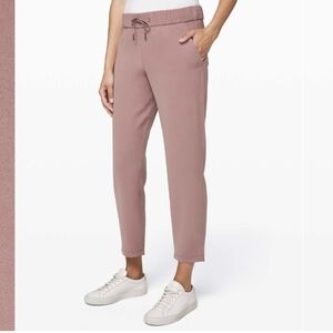 Lululemon on the fly pant woven NWT 10 pink red dust. REDU